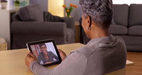 grandma video chatting on tablet