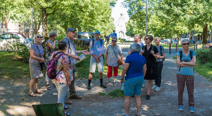 group of seniors with tour guide