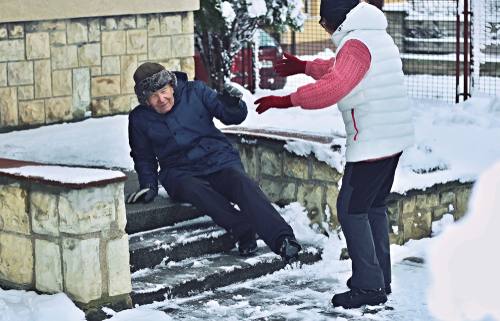 senior man falling on slipper steps