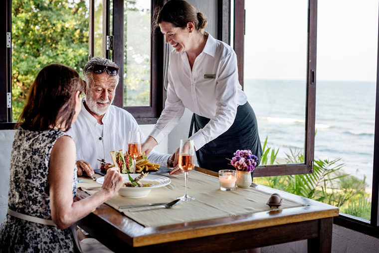 Mature couple having lunch at a restaurant