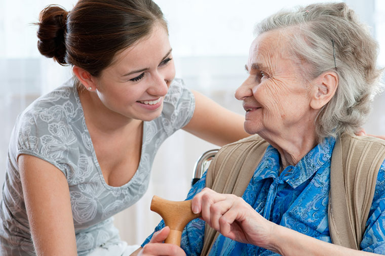 senior woman with caregiver