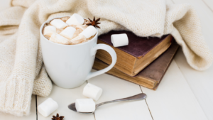 hot cocoa, blanket, and books